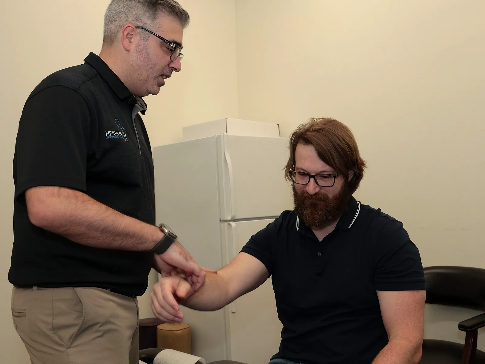 Heights Chiropractic Center treating arm pain in Houston