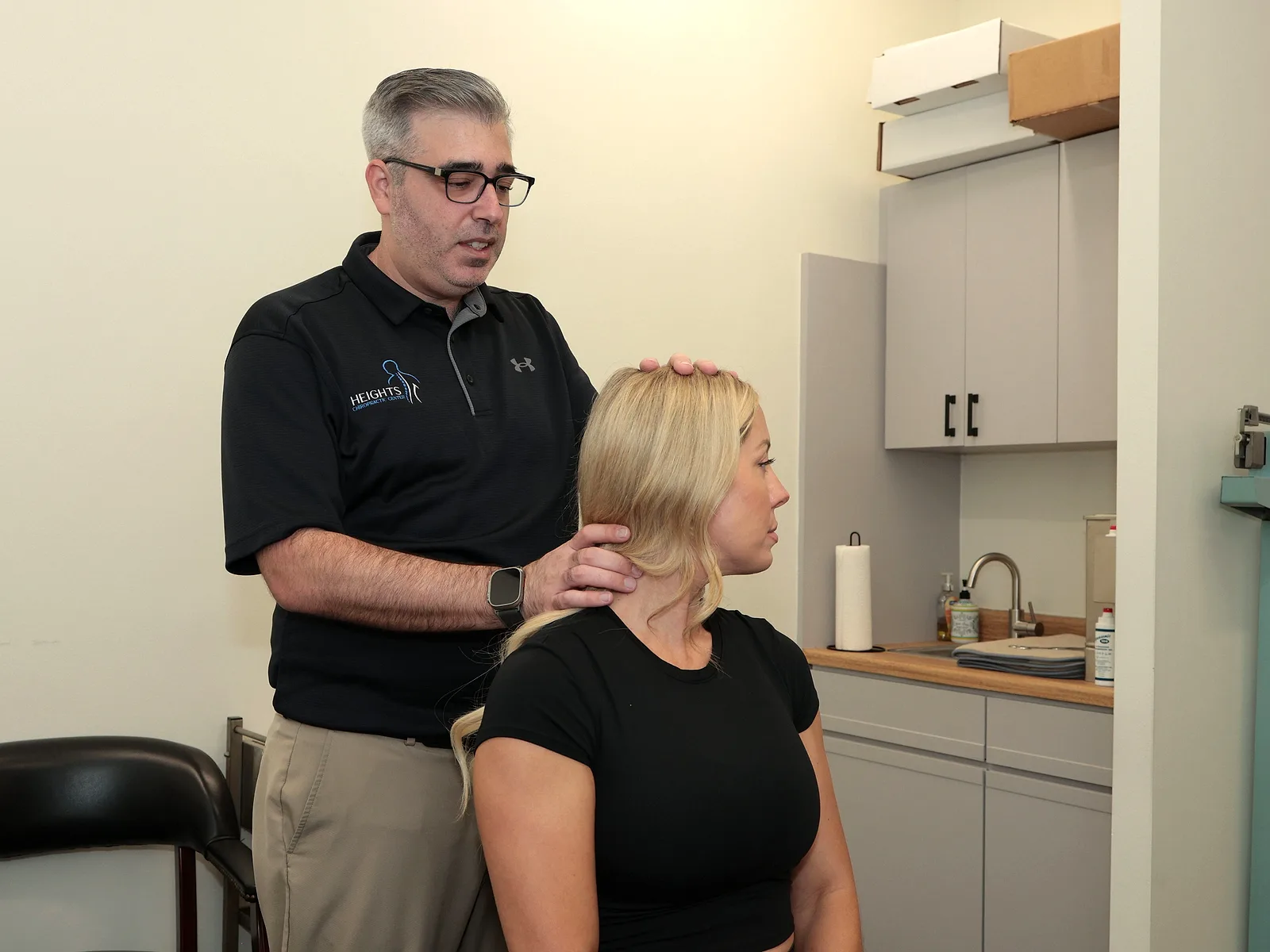 Heights Chiropractic Center treating neck pain in Houston